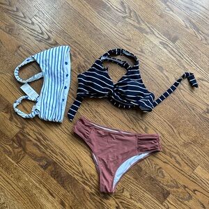 Blue and White Polka Dot and Striped Swimsuit Pieces.